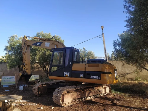 Bulldozer Cat 320BL - engins for rent in casablanca - RENTS.ma