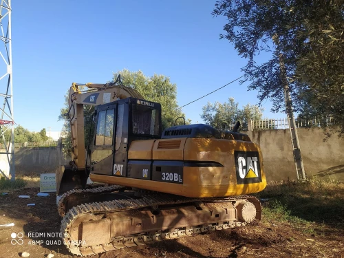 Bulldozer Cat 320BL - engins for rent in casablanca - RENTS.ma